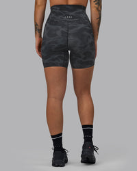 Woman wearing Elixir Ultra High-Rise 6" Short Pockets - Tranquil-Black