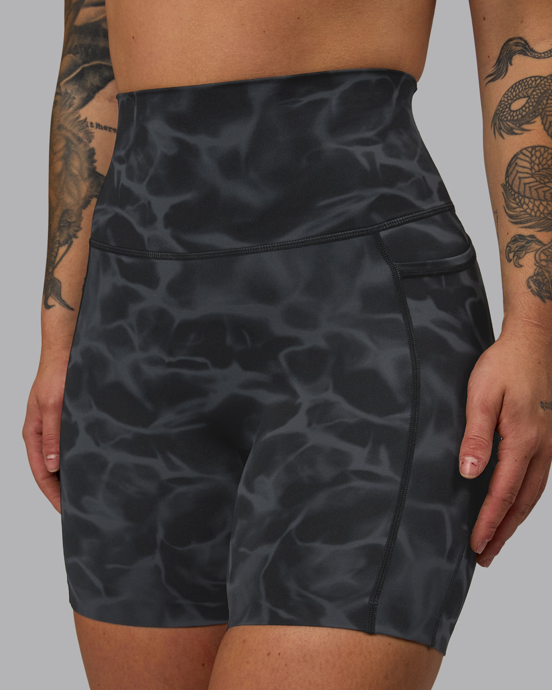 Woman wearing Elixir Ultra High-Rise 6" Short Pockets - Tranquil-Black