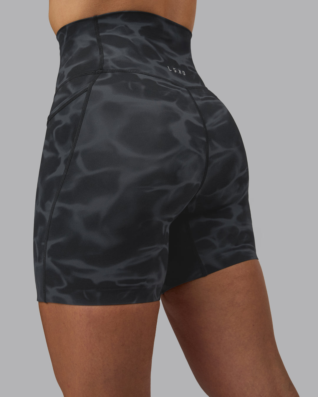 Woman wearing Elixir Ultra High-Rise 6" Short Pockets - Tranquil-Black