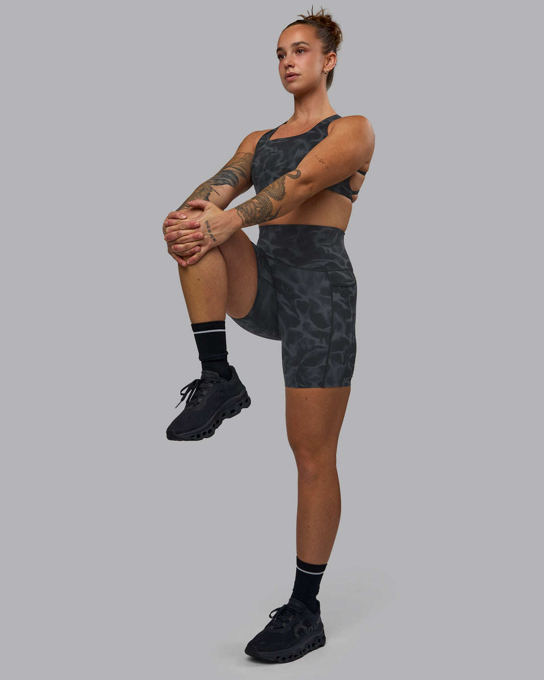 Woman wearing Elixir Ultra High-Rise 6" Short Pockets - Tranquil-Black