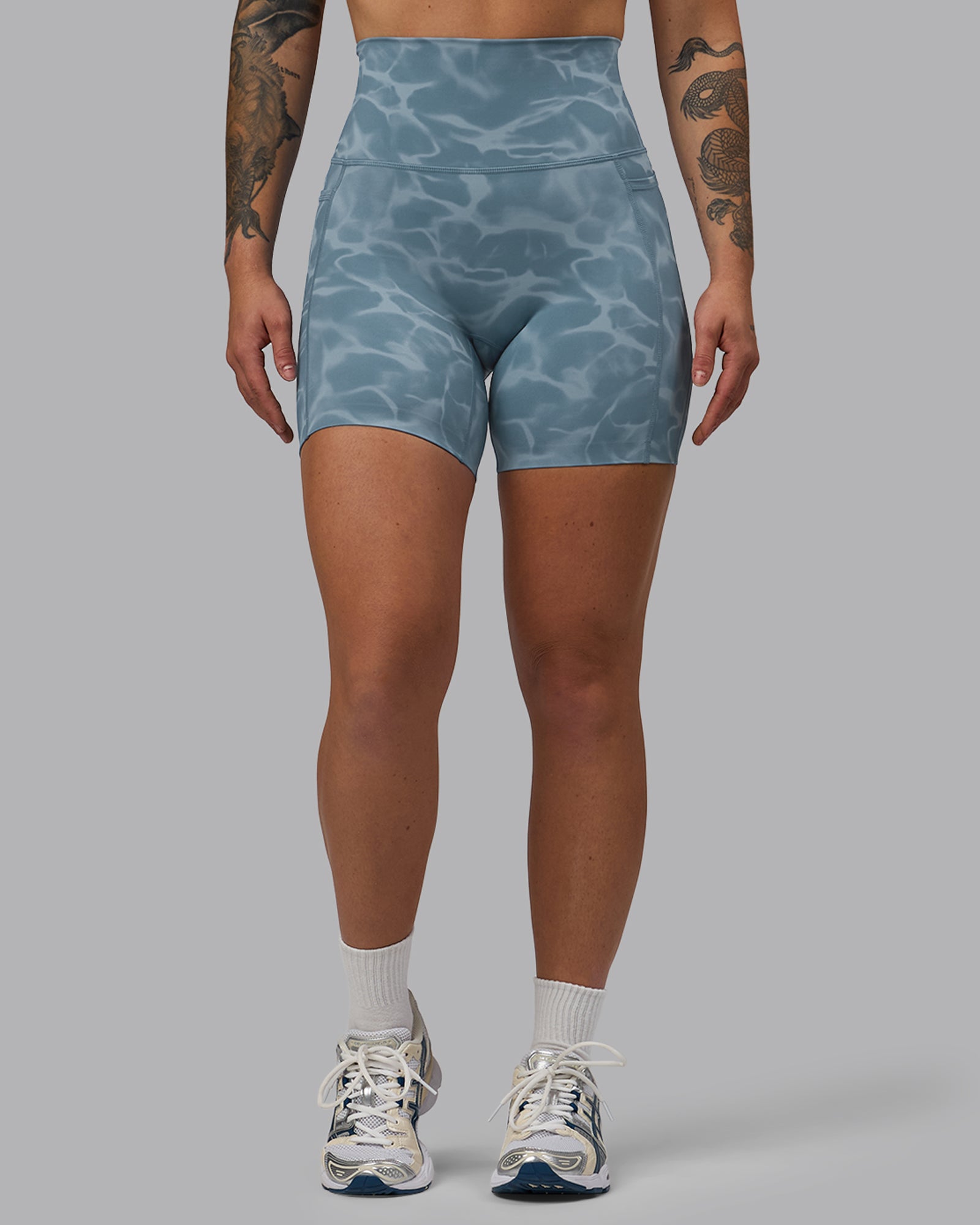 Woman wearing Elixir Ultra High-Rise 6" Short Pockets - Tranquil-Elemental Blue