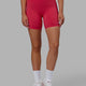 Woman wearing Elixir Mid Short Tights with Pockets - Raspberry