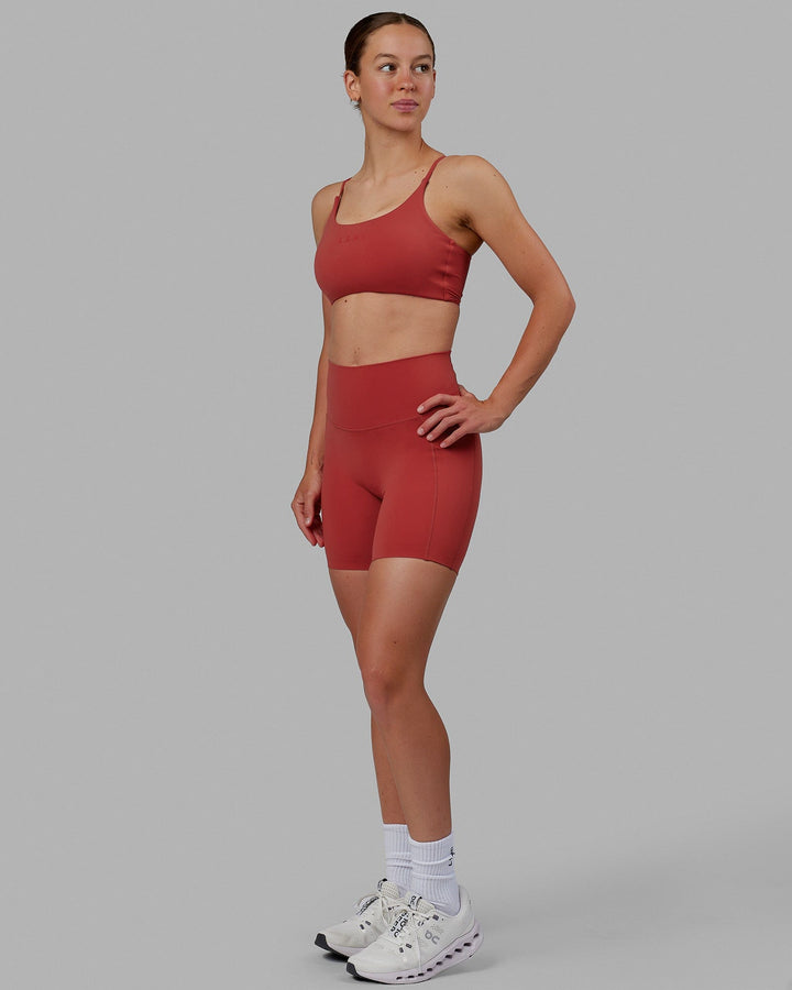 Woman wearing Elixir Mid Short Tights with Pockets - Cardinal