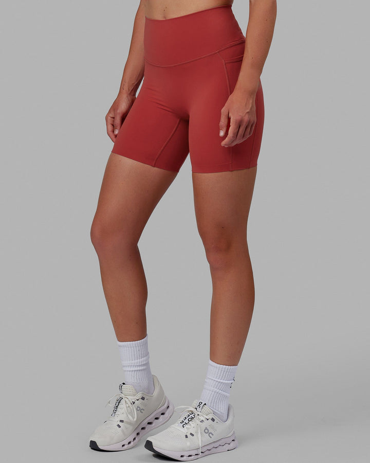 Woman wearing Elixir Mid Short Tights with Pockets - Cardinal