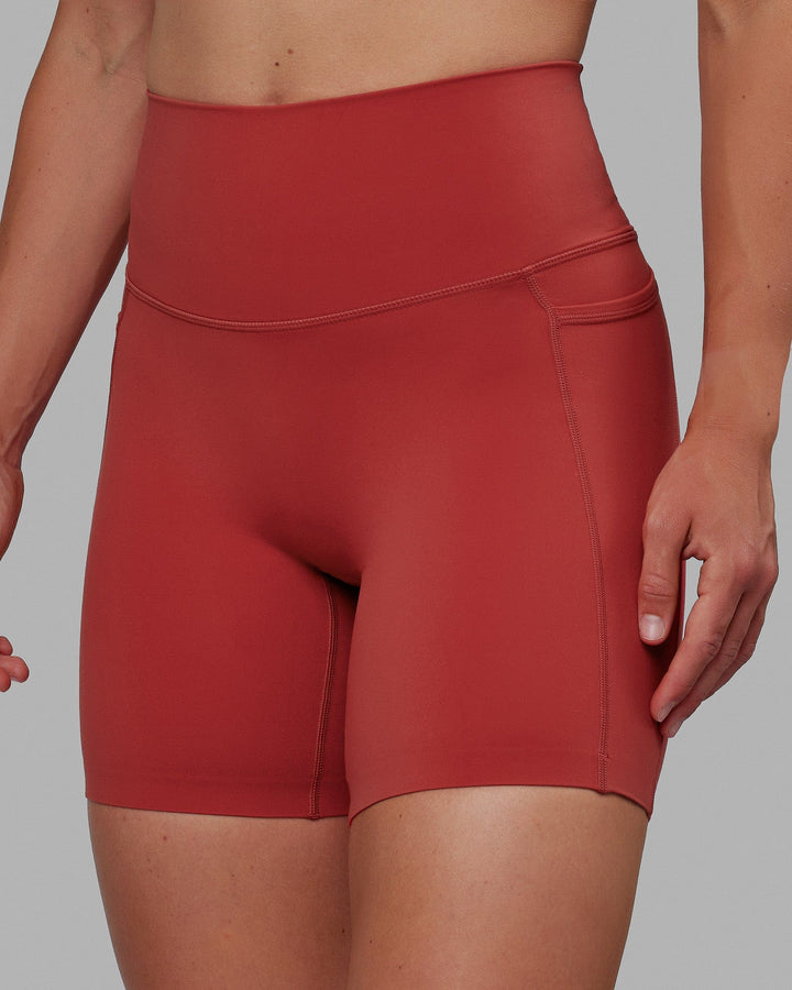 Woman wearing Elixir Mid Short Tights with Pockets - Cardinal