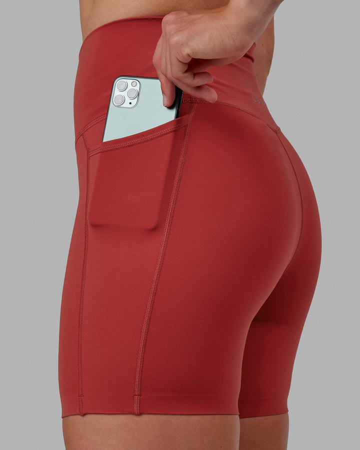 Woman wearing Elixir Mid Short Tights with Pockets - Cardinal