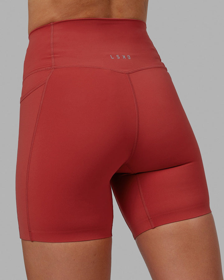 Woman wearing Elixir Mid Short Tights with Pockets - Cardinal