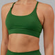 Woman wearing Elixir Sports Bra - Eden Green