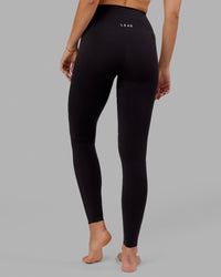 Woman wearing Elixir Ultra High-Rise Tall Legging - Black