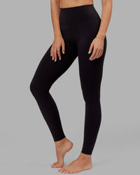 Woman wearing Elixir Ultra High-Rise Tall Legging - Black