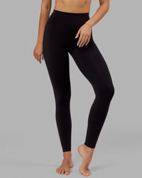 Woman wearing Elixir Ultra High-Rise Tall Legging - Black