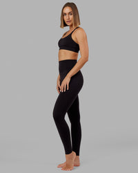 Woman wearing Elixir Ultra High-Rise Tall Legging - Black