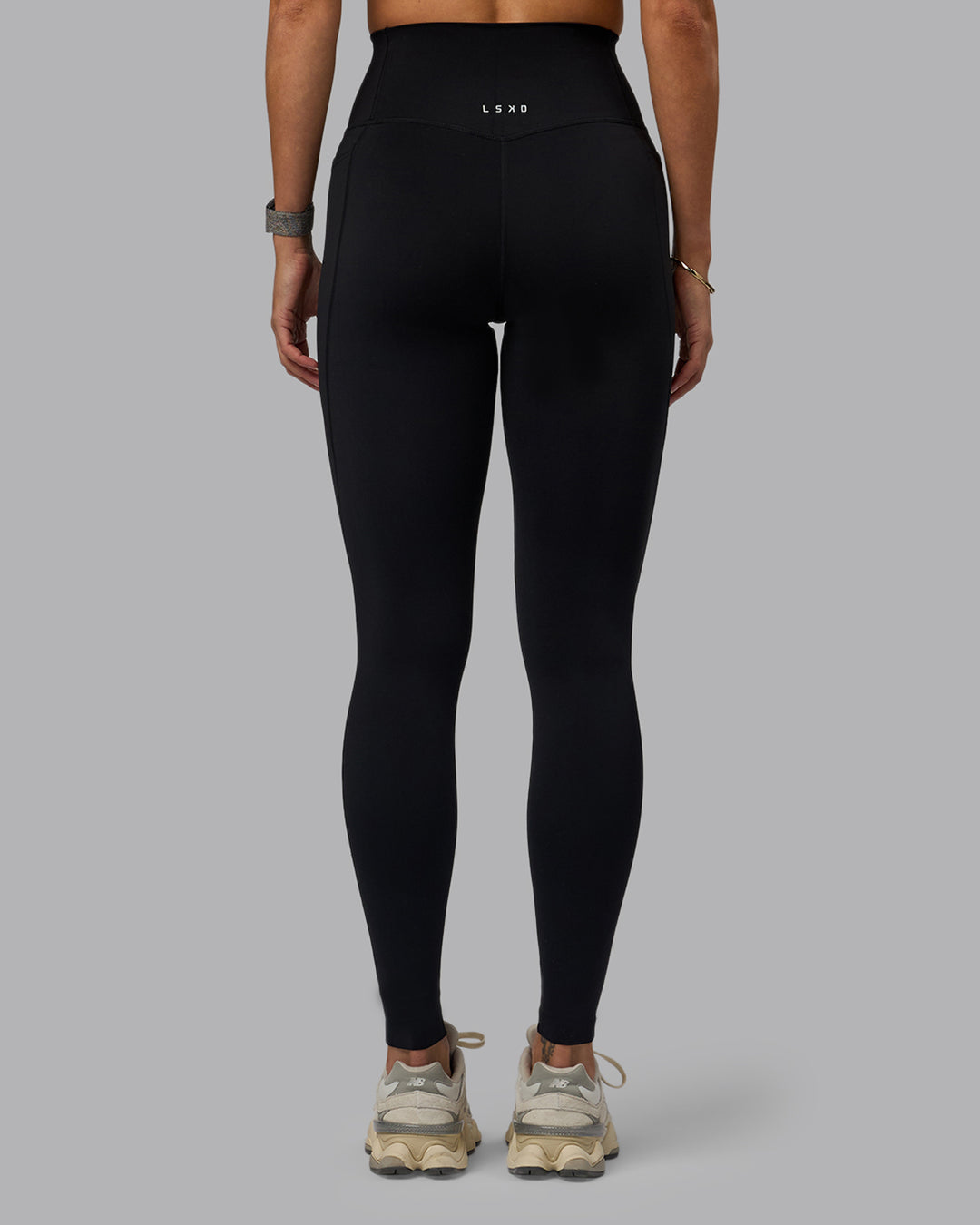 Woman wearing Elixir Ultra High-Rise Tall Legging Pockets - Black