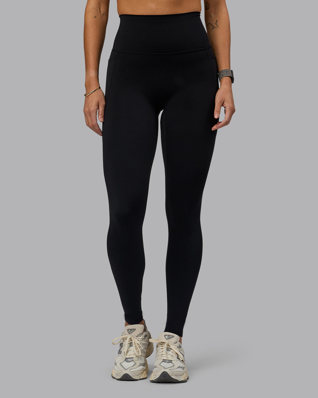 Woman wearing Elixir Ultra High-Rise Tall Legging Pockets - Black