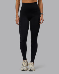 Woman wearing Elixir Ultra High-Rise Tall Legging Pockets - Black