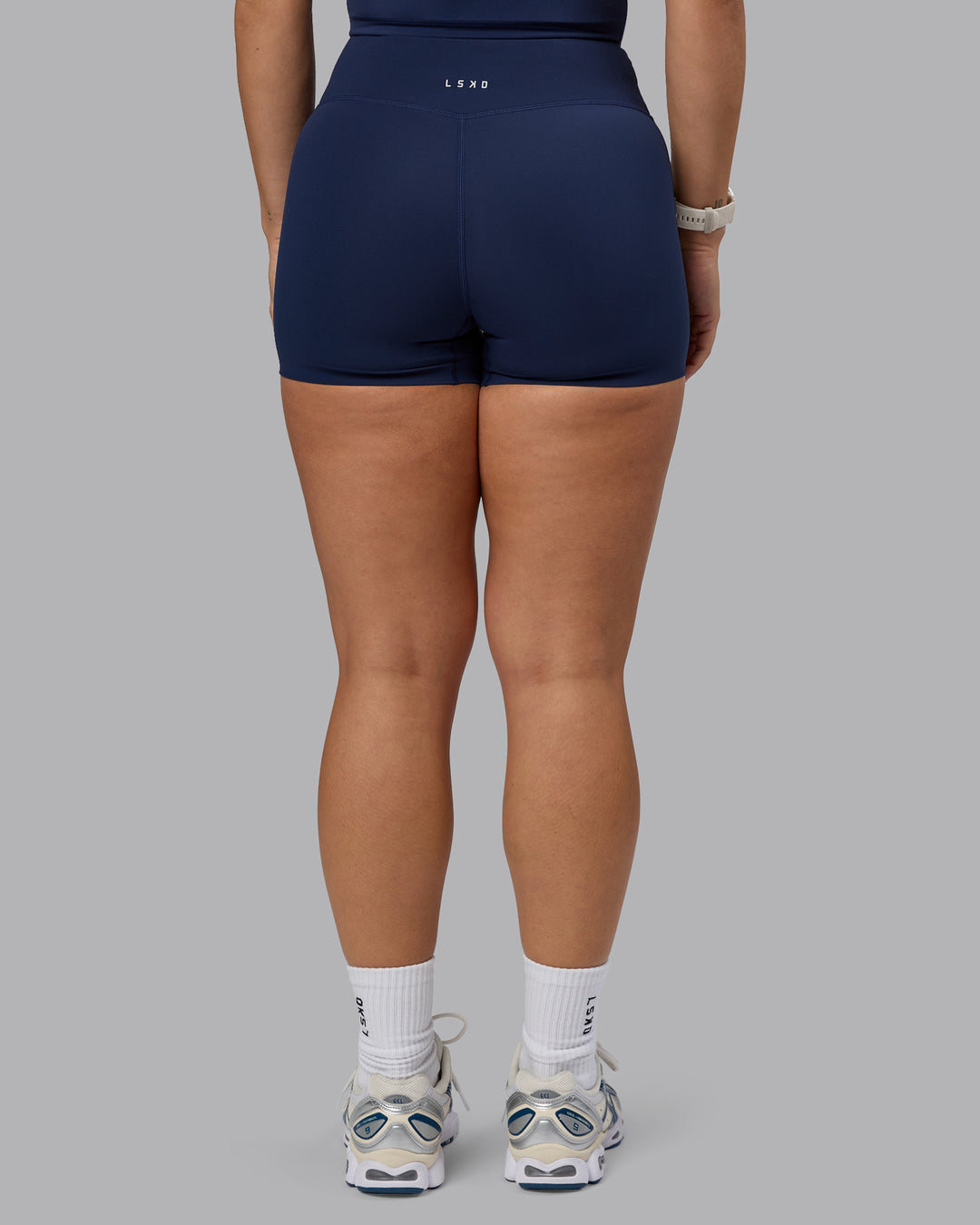 Woman wearing Elixir Ultra High-Rise 4&quot; Short - Future Navy | Model:Lyss | Size:S