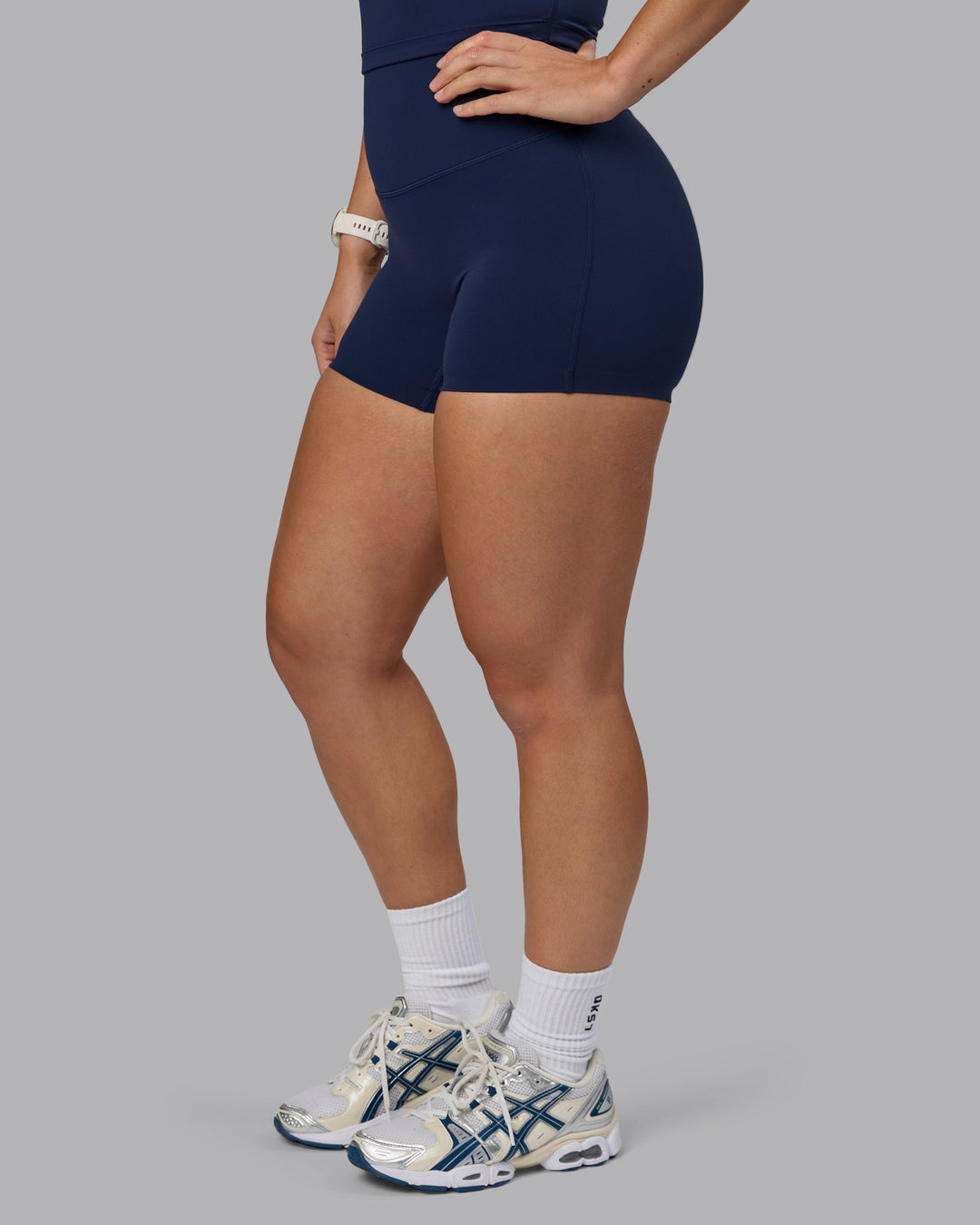 Woman wearing Elixir Ultra High-Rise 4&quot; Short - Future Navy | Model:Lyss | Size:S