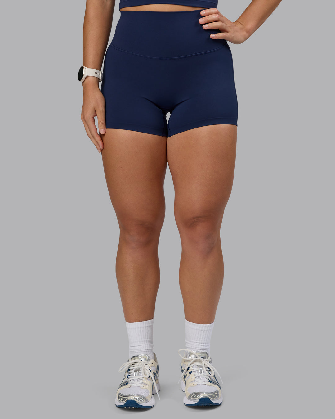 Woman wearing Elixir Ultra High-Rise 4&quot; Short - Future Navy | Model:Lyss | Size:S