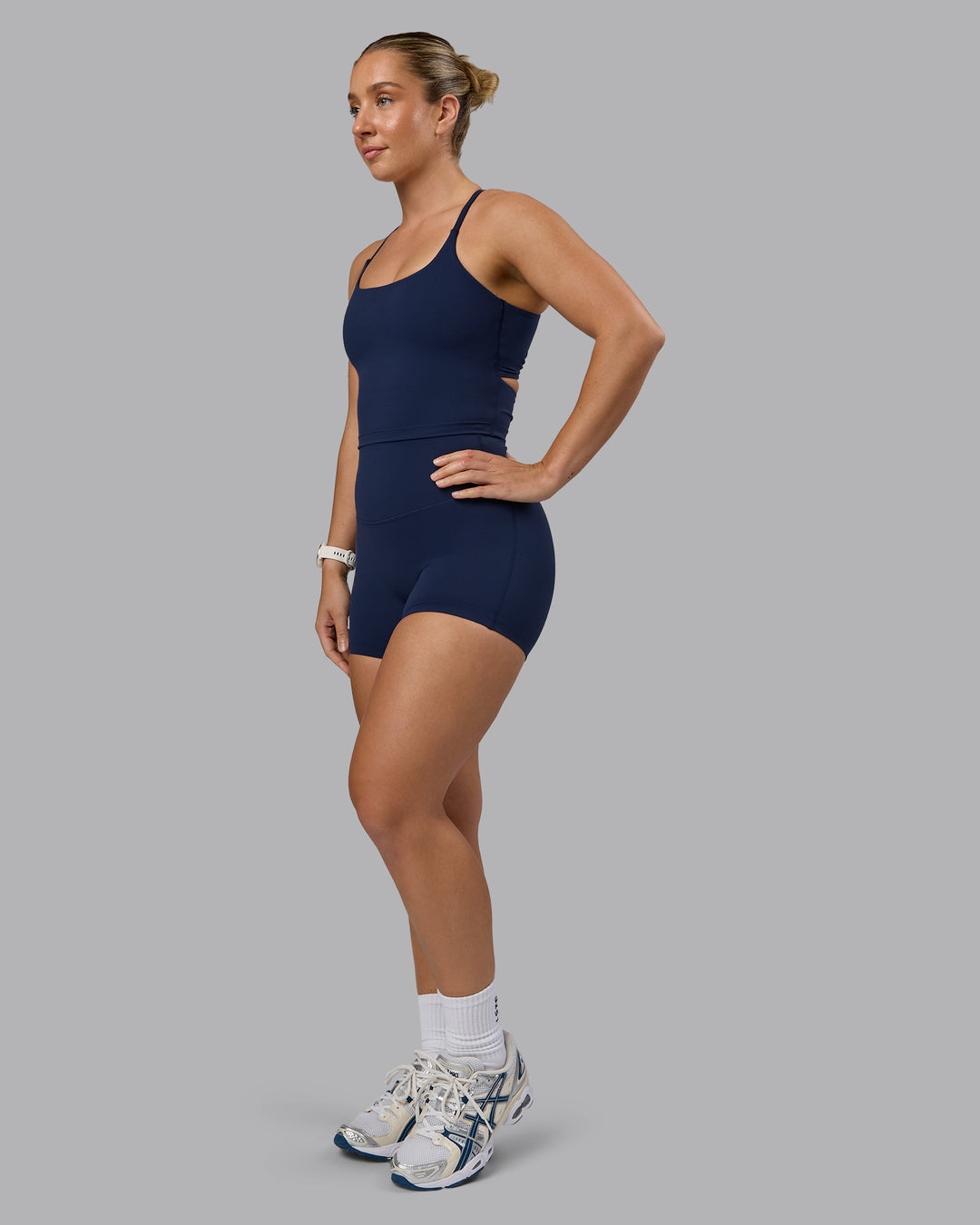 Woman wearing Elixir Ultra High-Rise 4&quot; Short - Future Navy | Model:Lyss | Size:S
