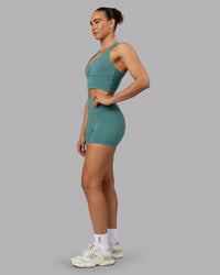 Woman wearing Elixir Ultra High-Rise 4" Short - Sagebrush | Model:Sophie | Size:S