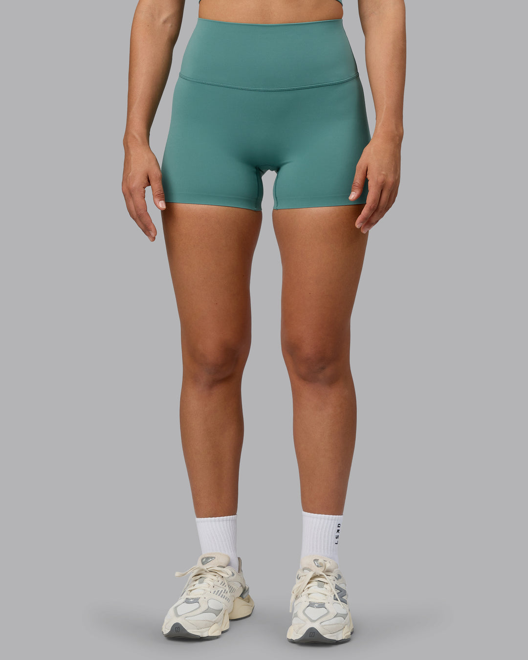 Woman wearing Elixir Ultra High-Rise 4&quot; Short - Sagebrush | Model:Sophie | Size:S