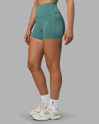 Woman wearing Elixir Ultra High-Rise 4" Short - Sagebrush | Model:Sophie | Size:S