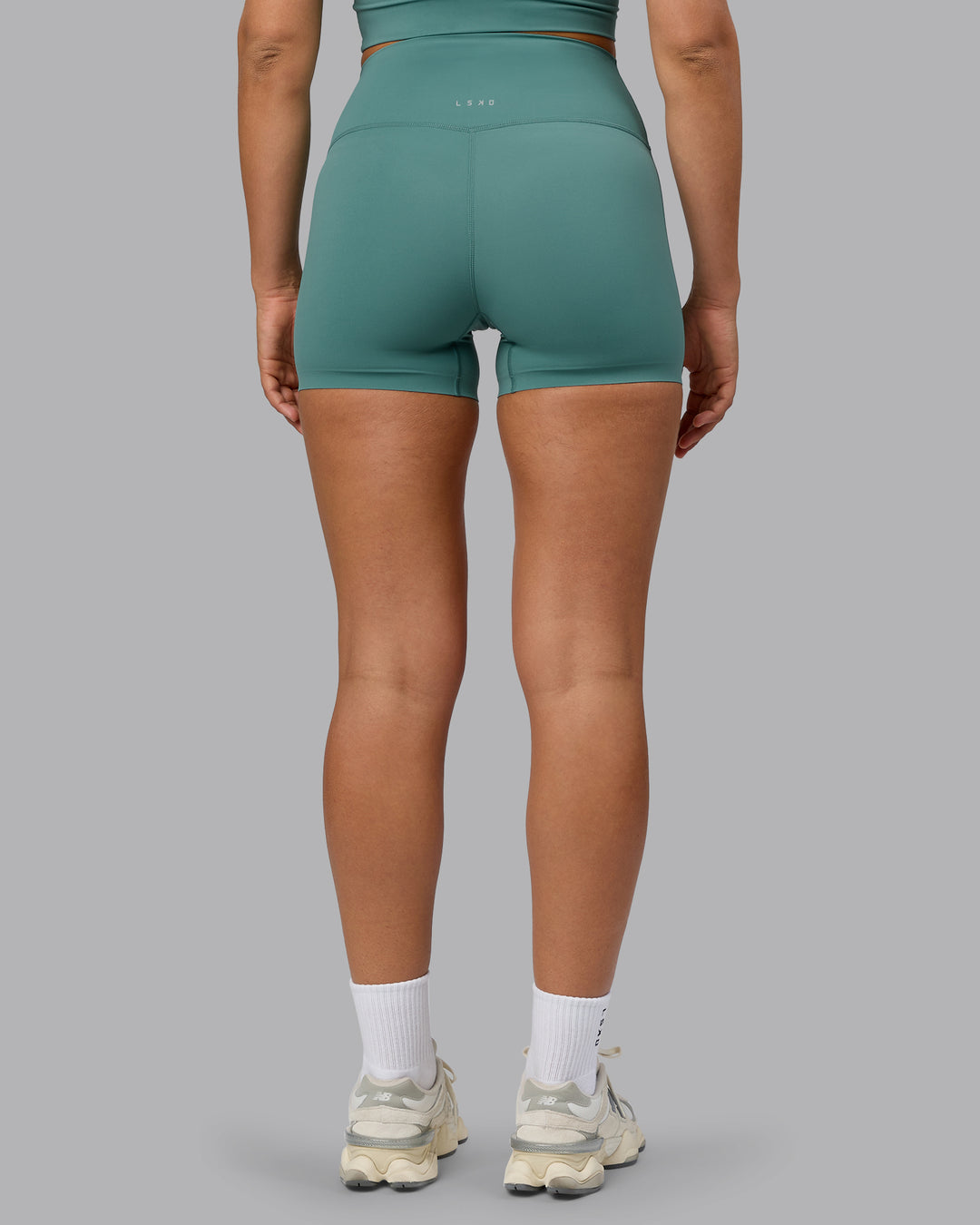 Woman wearing Elixir Ultra High-Rise 4&quot; Short - Sagebrush | Model:Sophie | Size:S