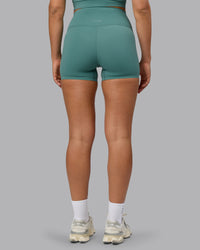 Woman wearing Elixir Ultra High-Rise 4" Short - Sagebrush | Model:Sophie | Size:S