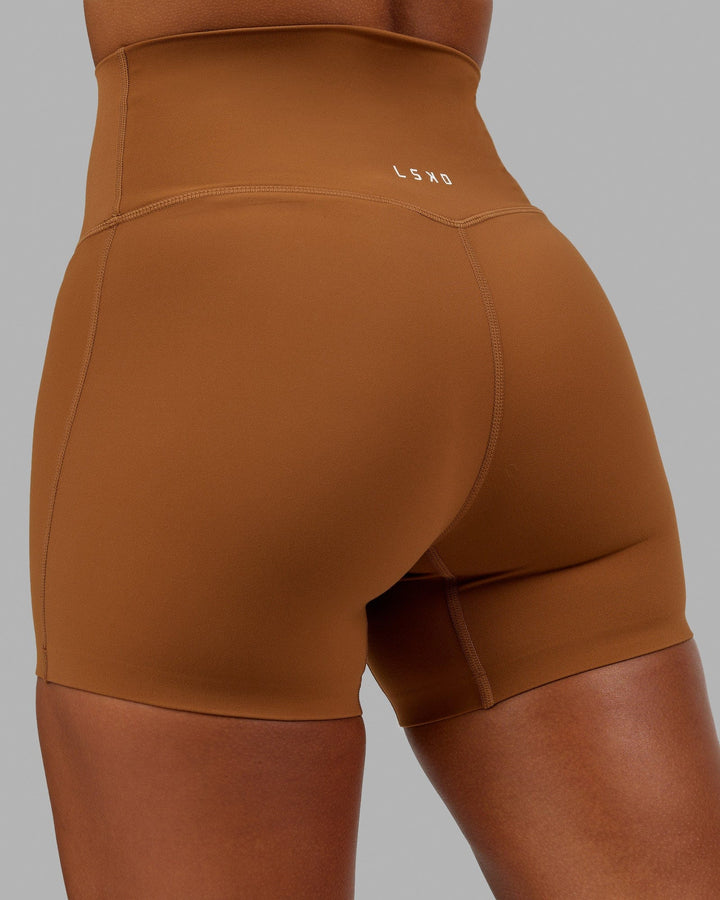 Woman wearing Elixir X-Short Tight - Camel