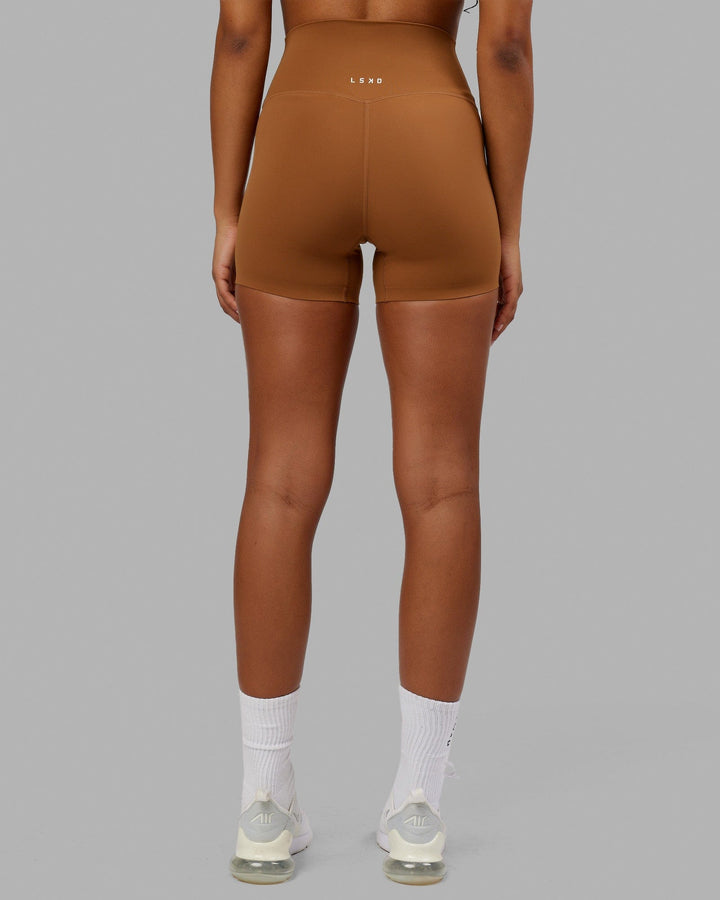 Woman wearing Elixir X-Short Tight - Camel