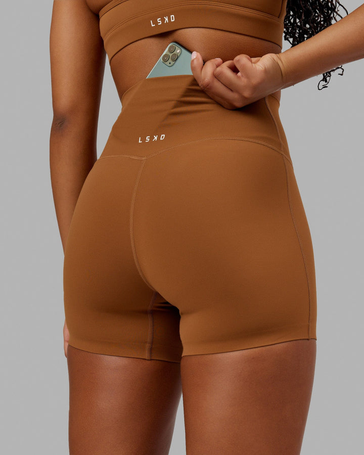Woman wearing Elixir X-Short Tight - Camel
