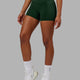 Woman wearing Elixir X-Short Tight - Ivy Green