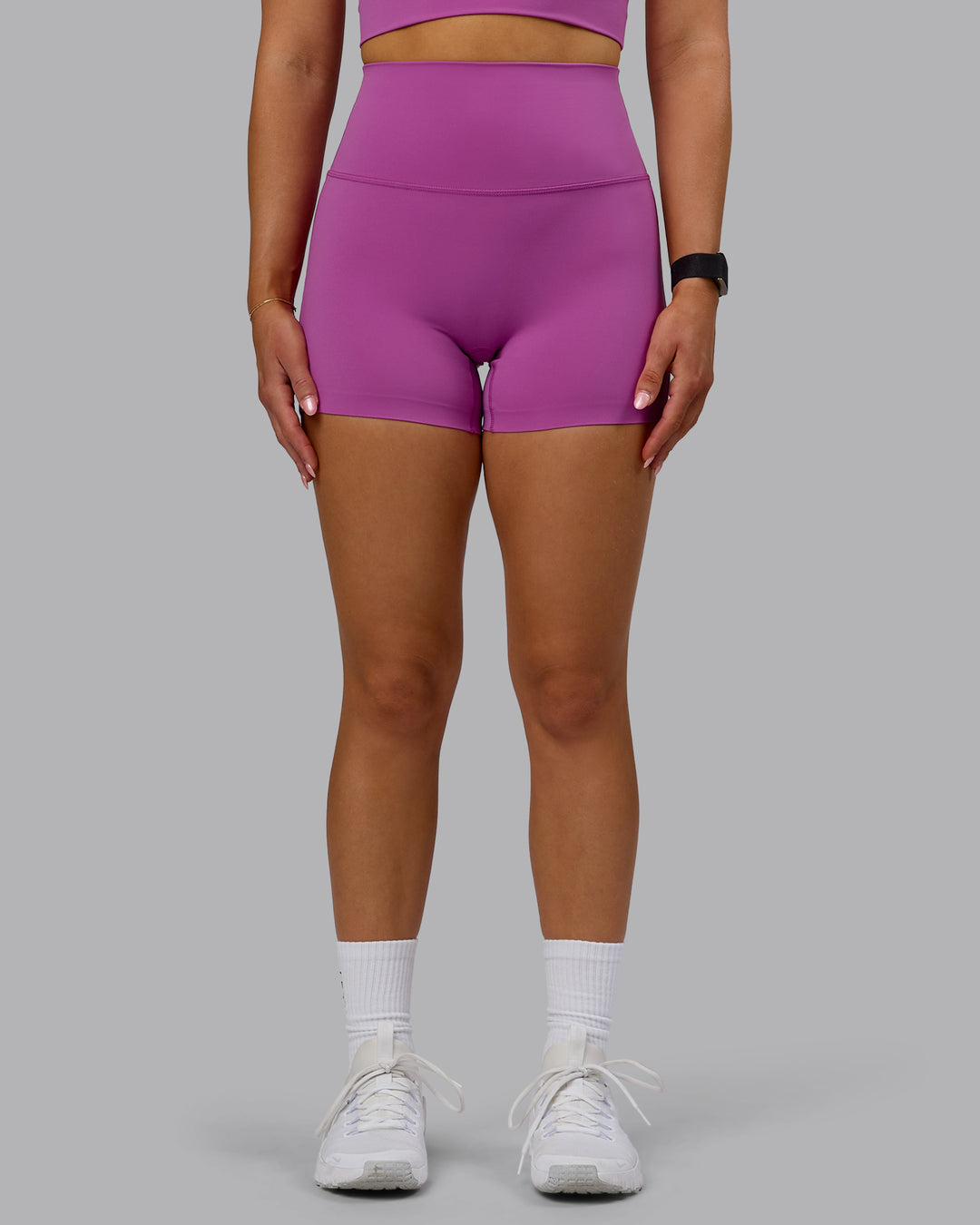 Woman wearing Elixir Ultra High-Rise 4&quot; Short - Orchid | Model:Halle | Size:S
