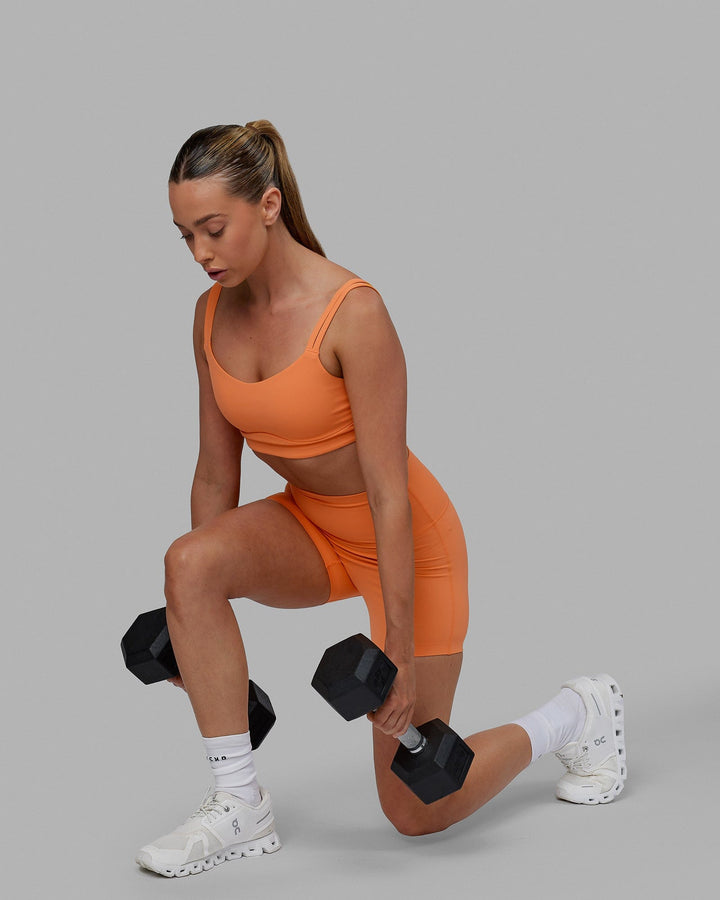 Woman wearing Elixir X-Short Tights - Tangerine