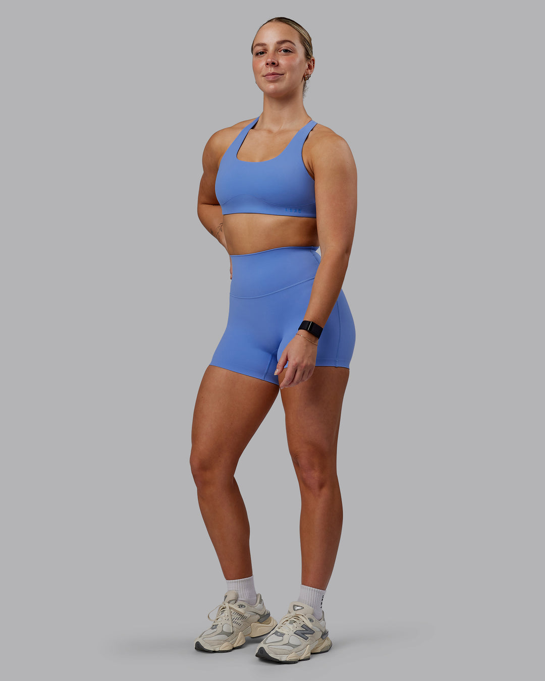 Woman wearing Elixir Ultra High-Rise 4&quot; Short - Ultramarine | Model:Suz | Size:S
