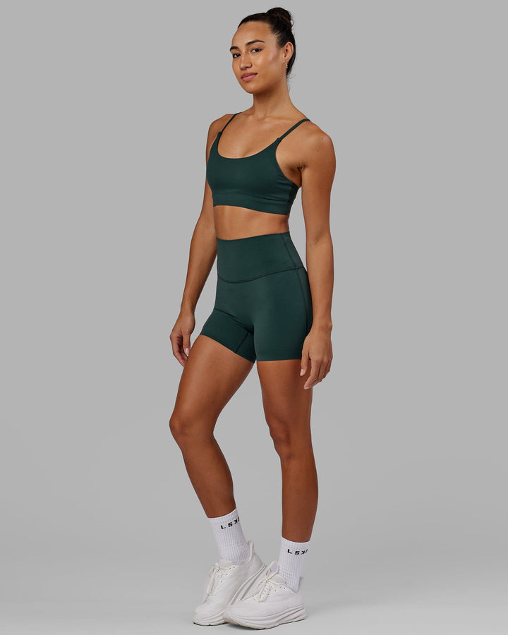 Woman wearing Elixir X-Short Tight - Vital Green