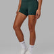 Woman wearing Elixir X-Short Tight - Vital Green