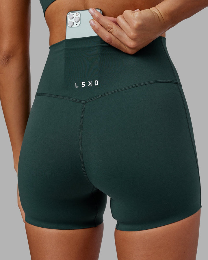 Woman wearing Elixir X-Short Tight - Vital Green