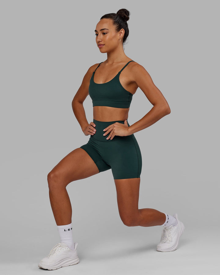 Woman wearing Elixir X-Short Tight - Vital Green