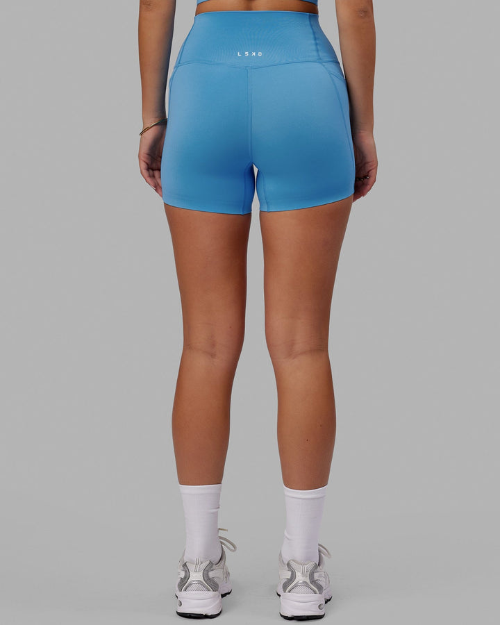 Woman wearing Elixir X-Short Tight With Pockets - Azure Blue