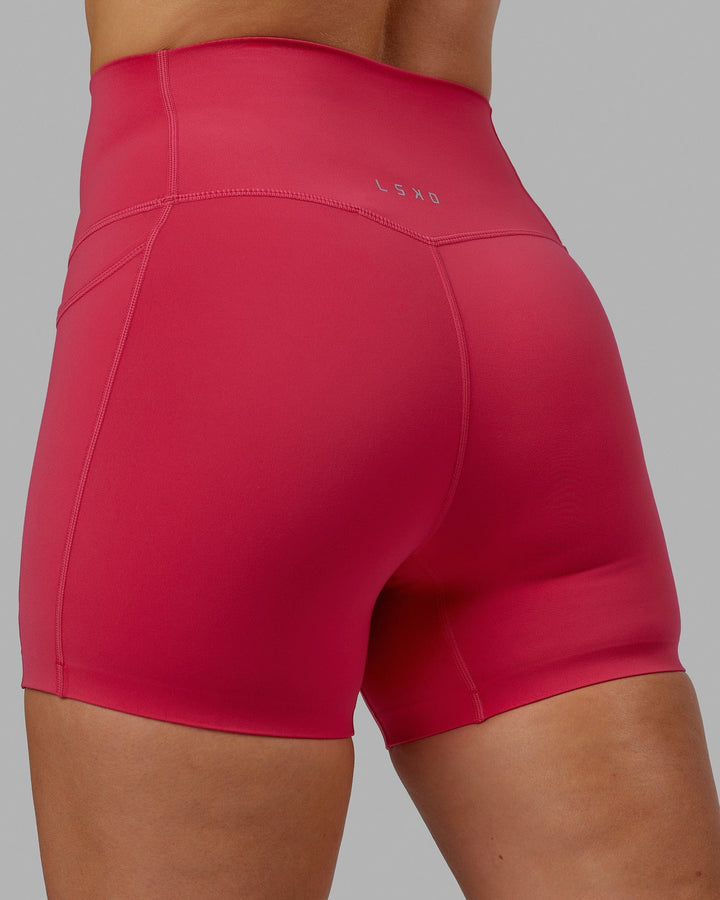 Woman wearing Elixir X-Short Tights With Pockets - Raspberry