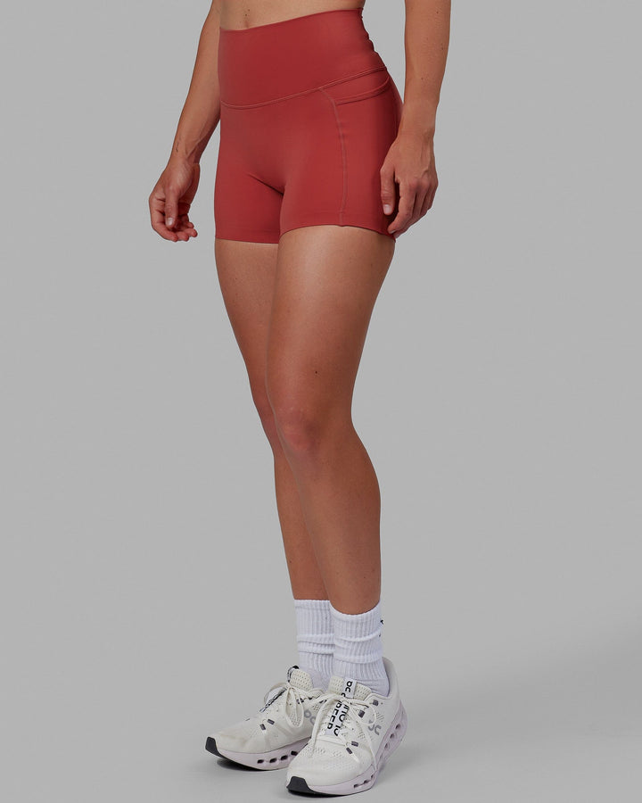 Woman wearing Elixir X-Short Tights With Pockets - Cardinal