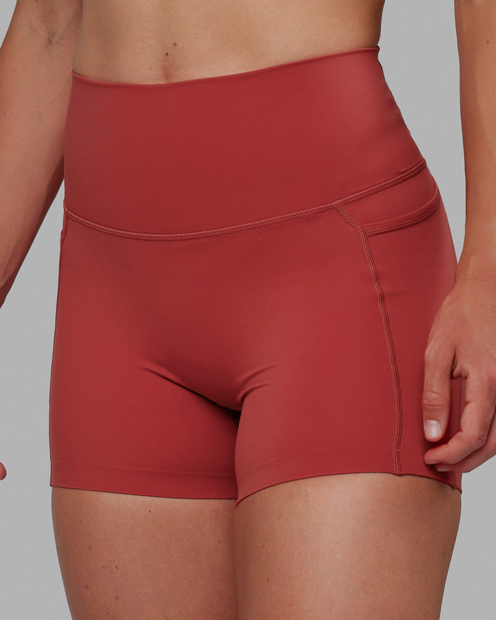 Woman wearing Elixir X-Short Tights With Pockets - Cardinal