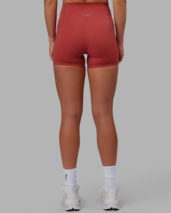 Woman wearing Elixir X-Short Tights With Pockets - Cardinal