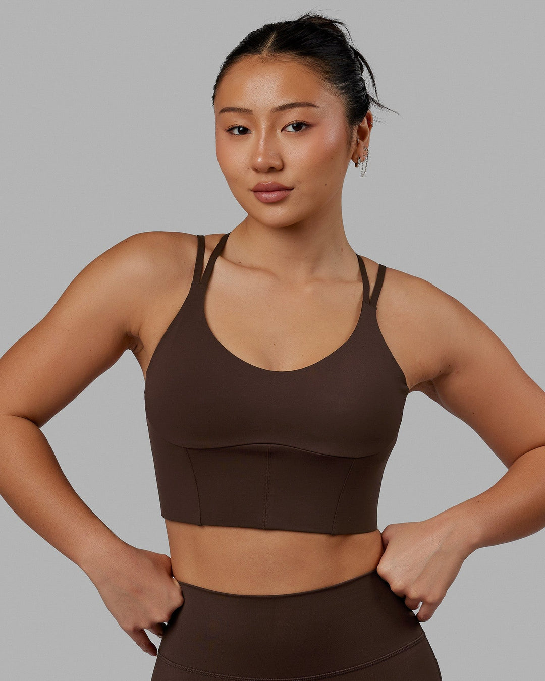 Woman wearing Empower Corset Bra - Dark Chocolate