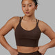 Woman wearing Empower Corset Bra - Dark Chocolate