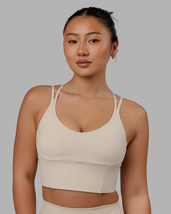 Woman wearing Empower Corset Bra - Shale Beige