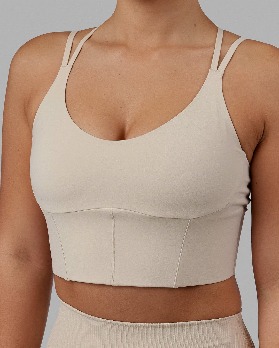 Woman wearing Empower Corset Bra - Shale Beige