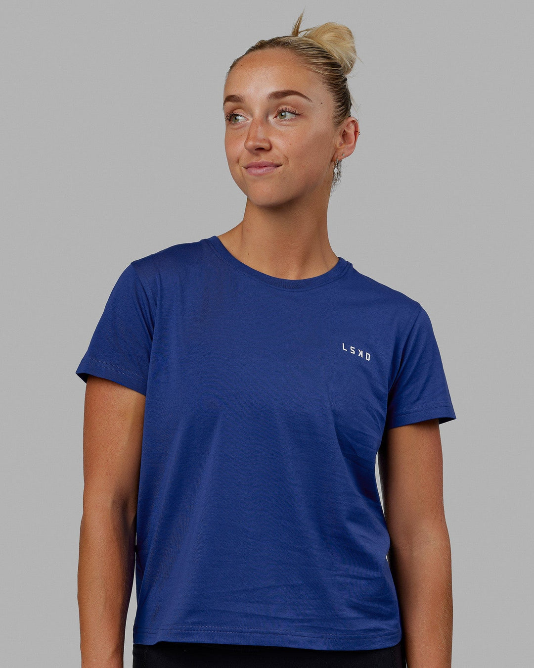 Woman wearing Endeavour FLX Cotton Tee - Galactic Cobalt-White