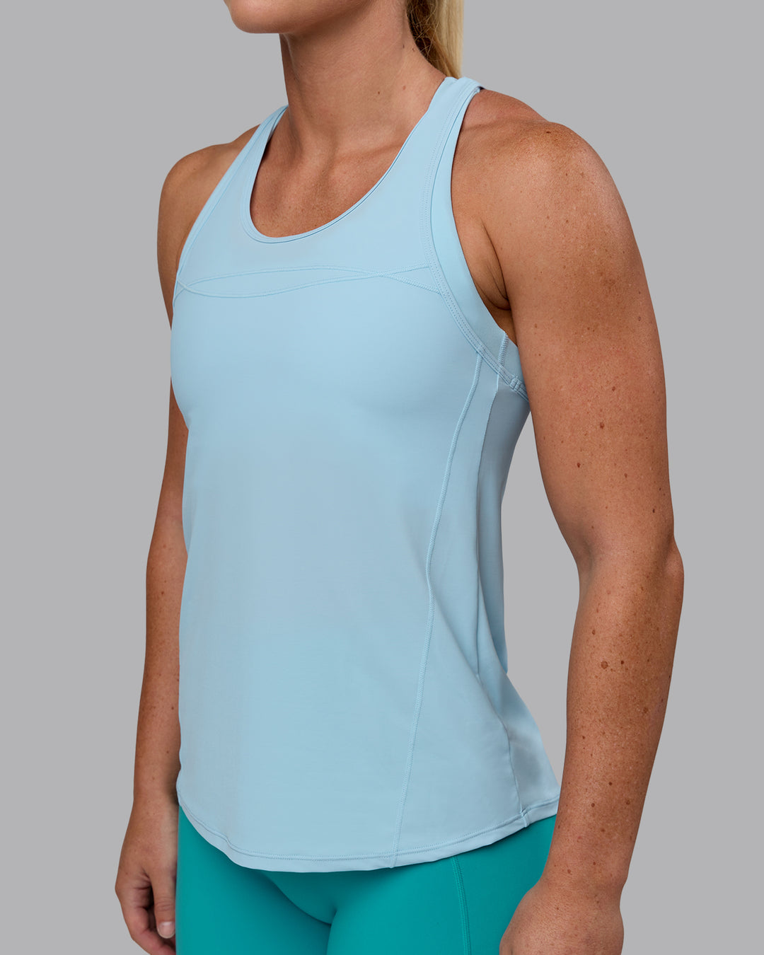 Woman wearing Endorphin Rush Tank - Glacial Blue
